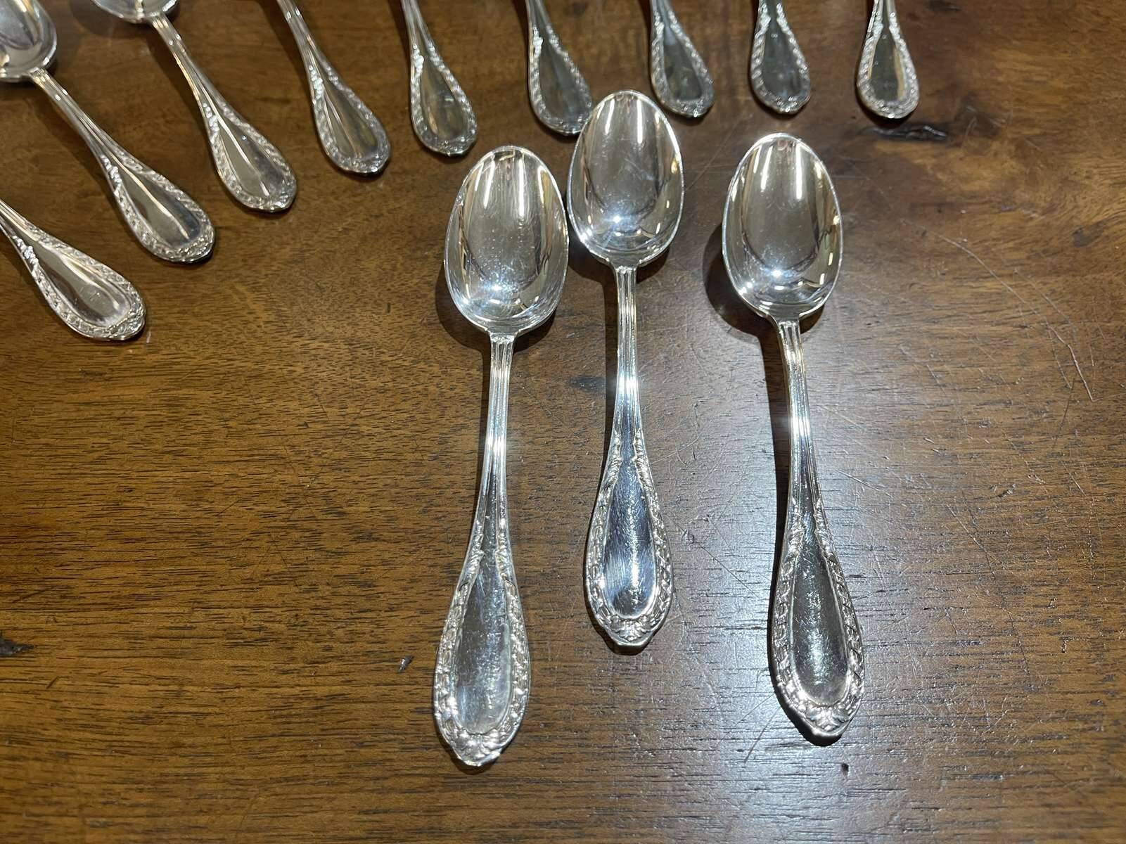 Set of 12 French silver plated dessert spoons