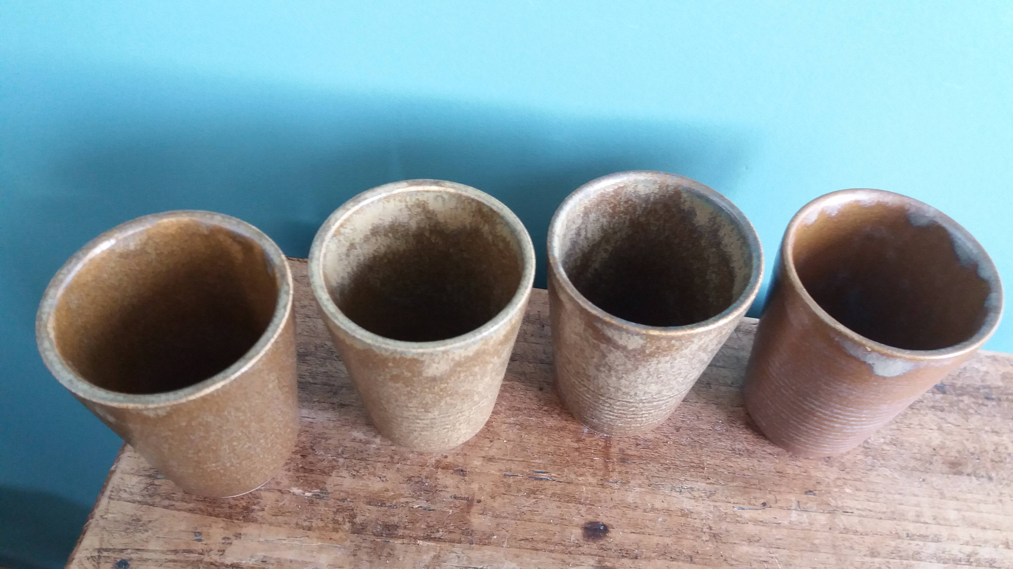 Digoin stoneware mugs, glasses, and cups.