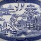 Large oval dish in blue and white English earthenware with Asian decoration, 19th century.