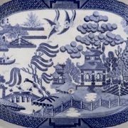 Large oval dish in blue and white English earthenware with Asian decoration, 19th century.