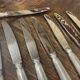 Set of 12 silver-plated metal knives, shell model, from CAILAR BAYARD