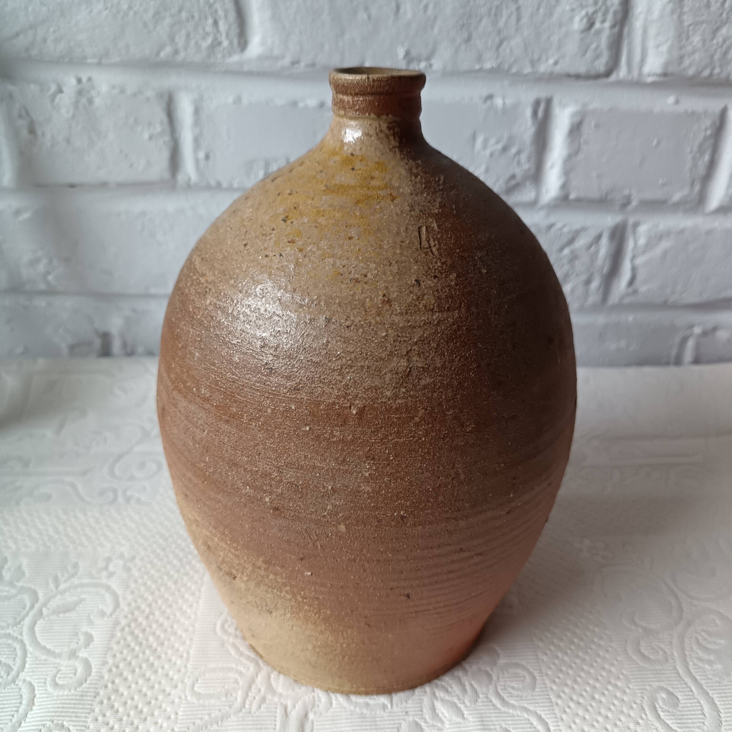 Old beige-brown stoneware jar France