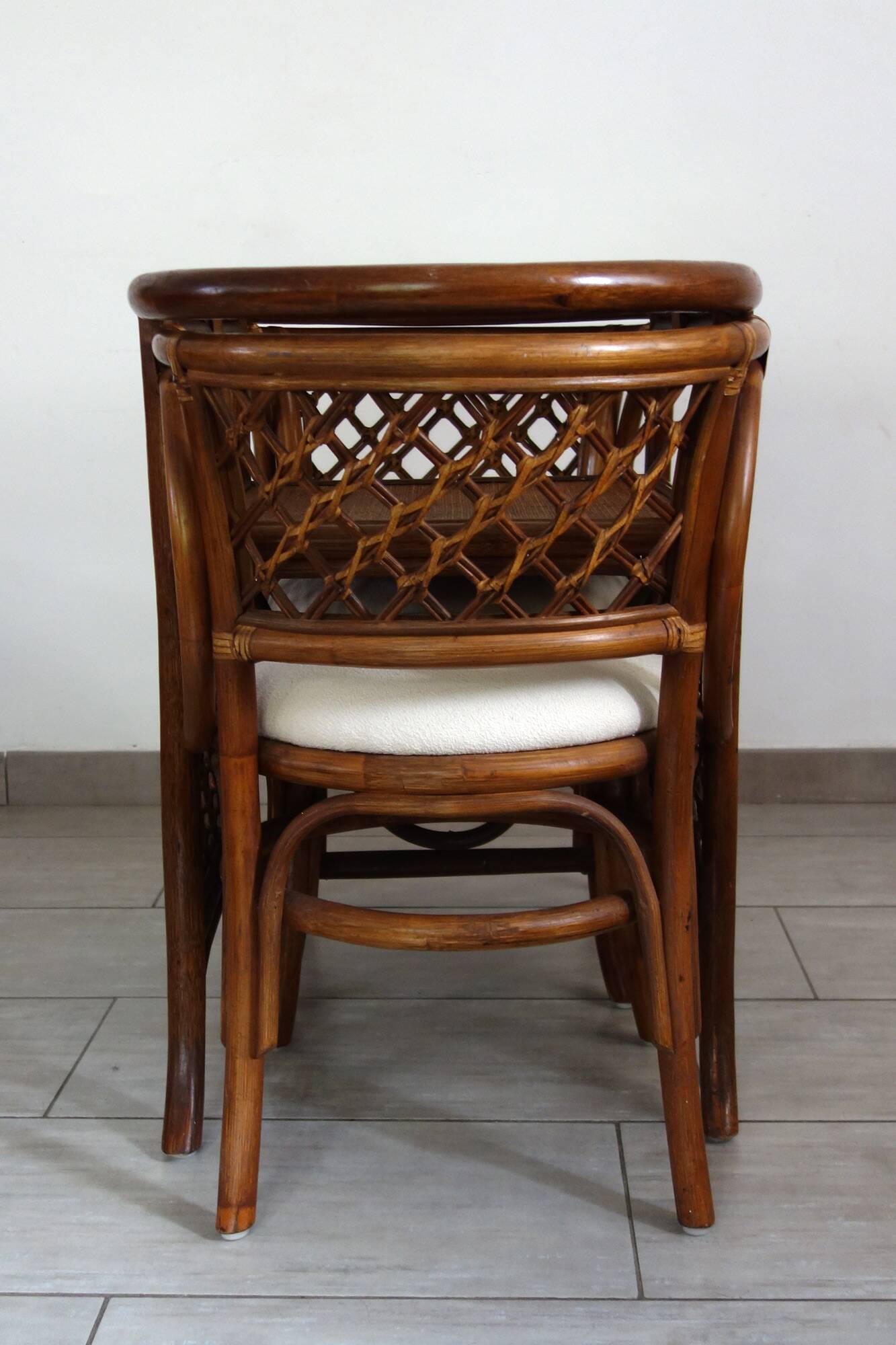 Rattan set with table and two armchairs.
