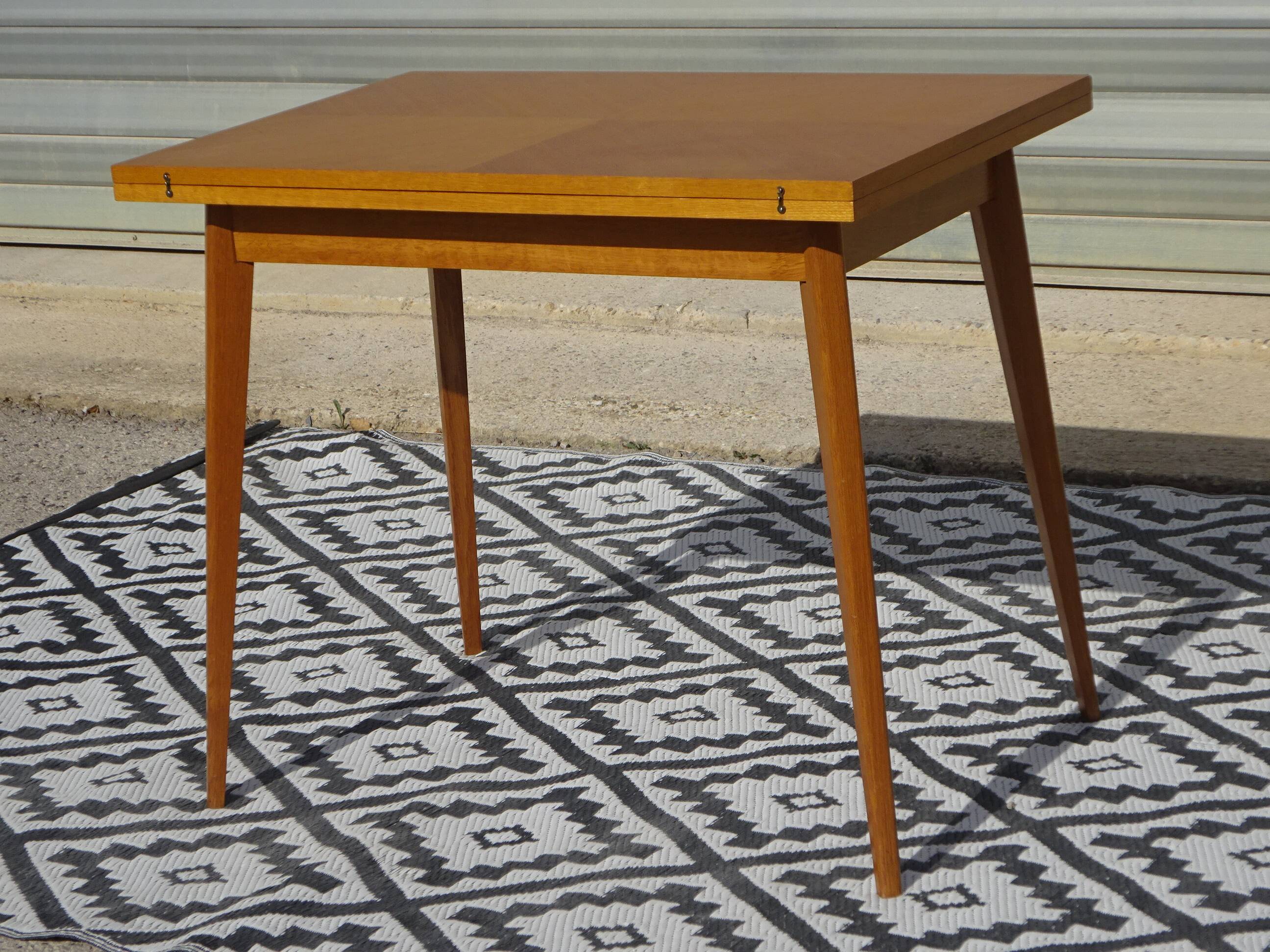 Scandinavian portfolio table model "half-century" by SAM