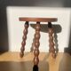 Turned wooden tripod stool