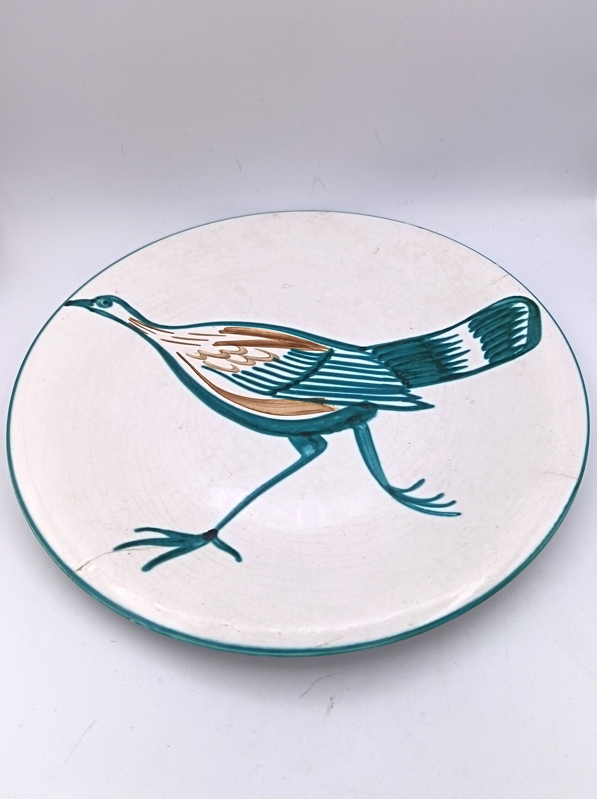 Large ceramic dish signed Roger Picault