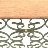 The wrought iron radiator cover