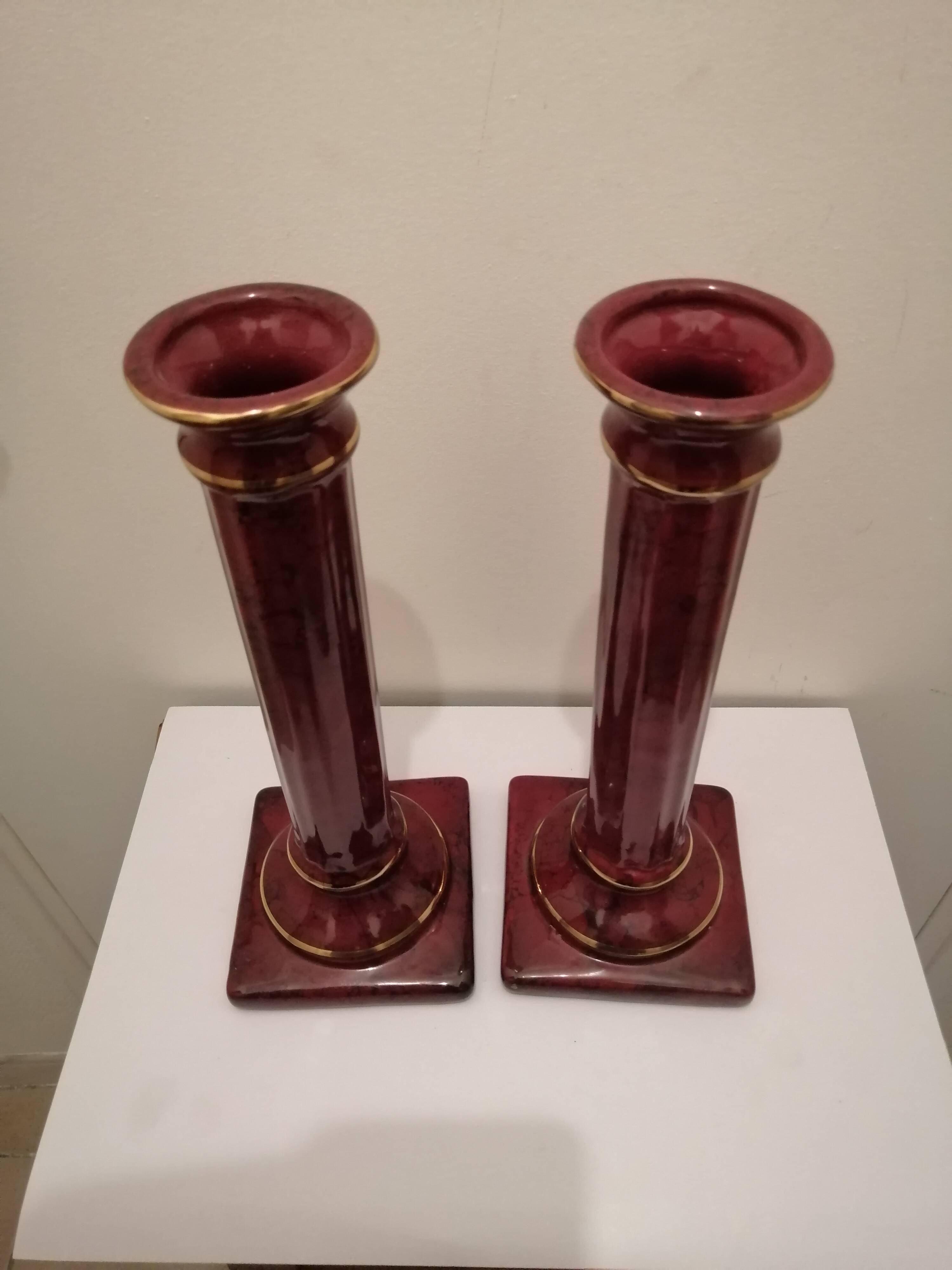 PAIR OF CERAMIC TORCHES