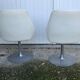 Pair of vintage armchairs with swivel tulip feet