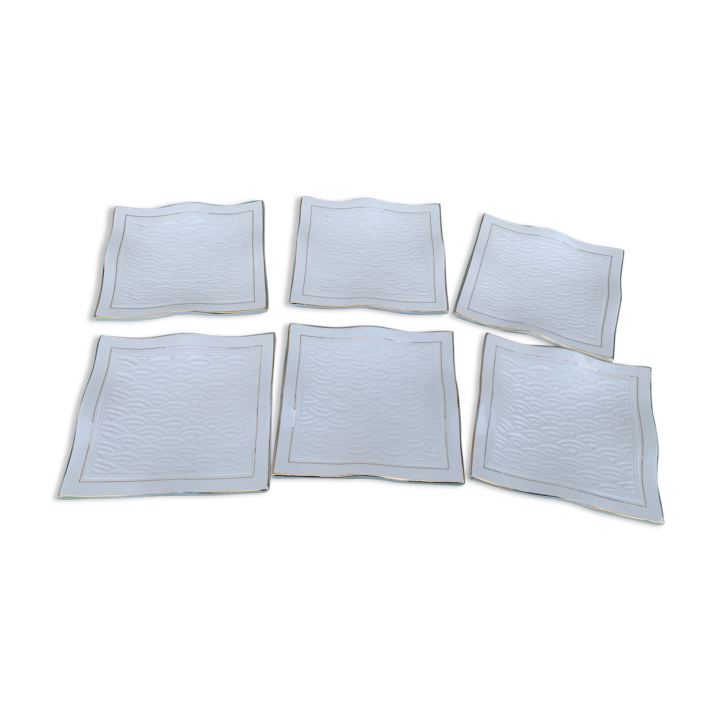 6 white glazed ceramic plates vague design and contemporary patterns