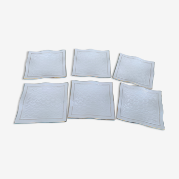 6 white glazed ceramic plates vague design and contemporary patterns