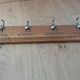 Tea towel holder, wooden and metal towel hook.