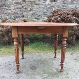 Table ovale ancienne en cerisier pieds parapluie