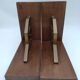 Pair of Breton couple bookends in bronze and wood.