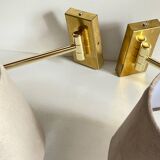 articulated brass and velvet wall light
