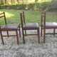 6 chaises vintage scandinave en teck , assises skaï noir en l’état