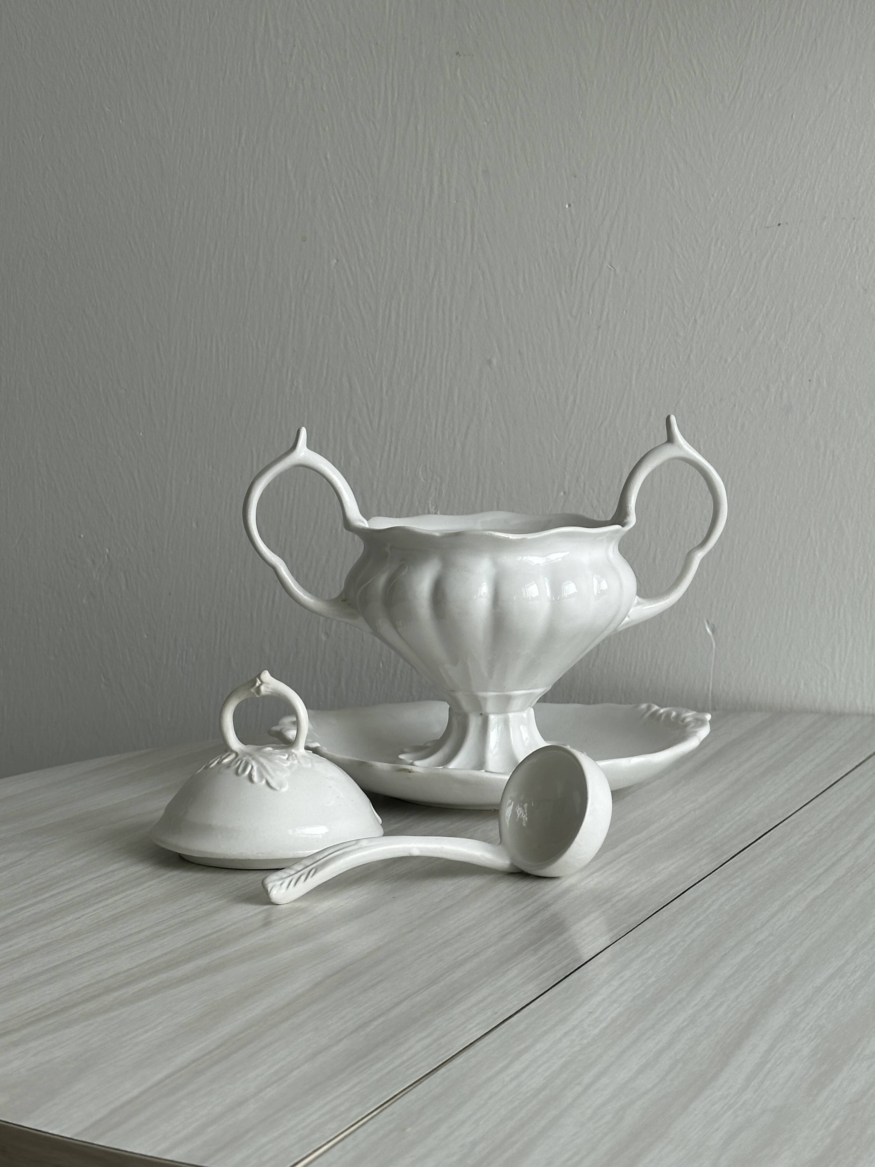 Antique white porcelain sauce boat