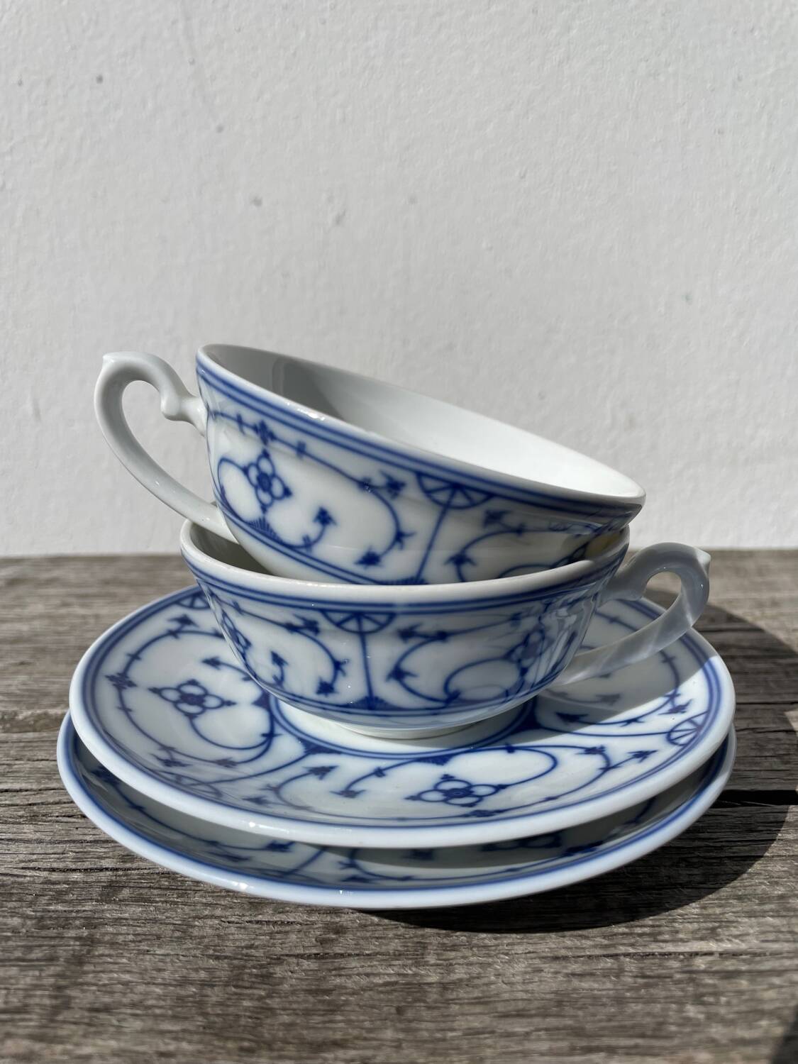 Pair of signed blue porcelain cups