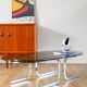 Oval coffee table in smoked glass and chrome, original double S design base, 1970.