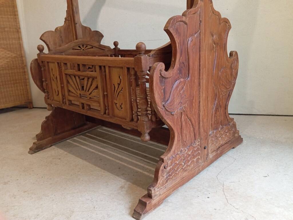 Solid teak carved swing cradle