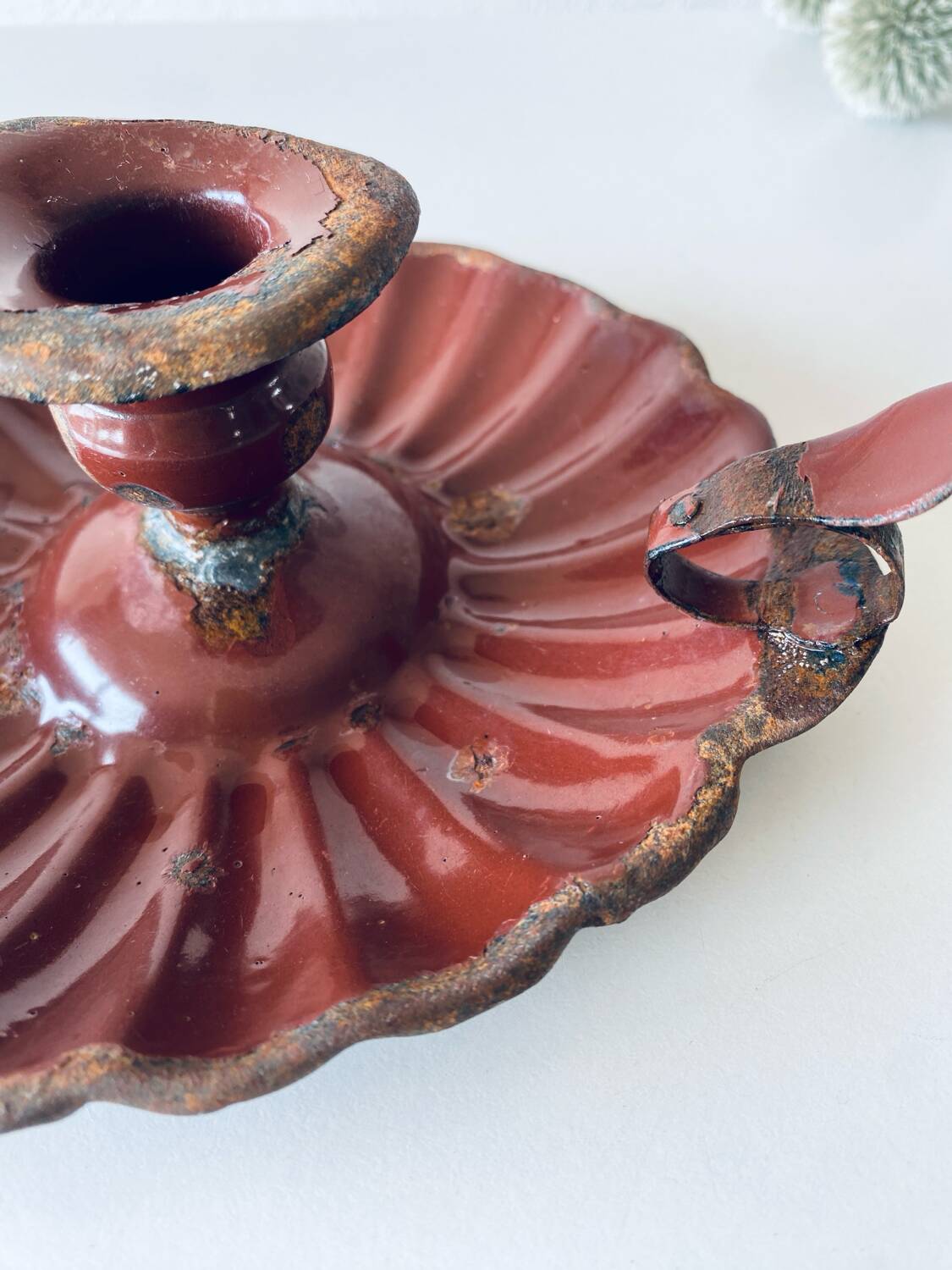 Antique enamelled candle holder