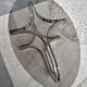 Chrome metal coffee table and oval smoked glass tray