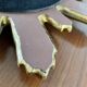 Vintage sun mirror in 60s/70s gold resin