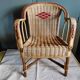 Ancien fauteuil / chaise d'enfant vintage des années 60 en osier / rotin
