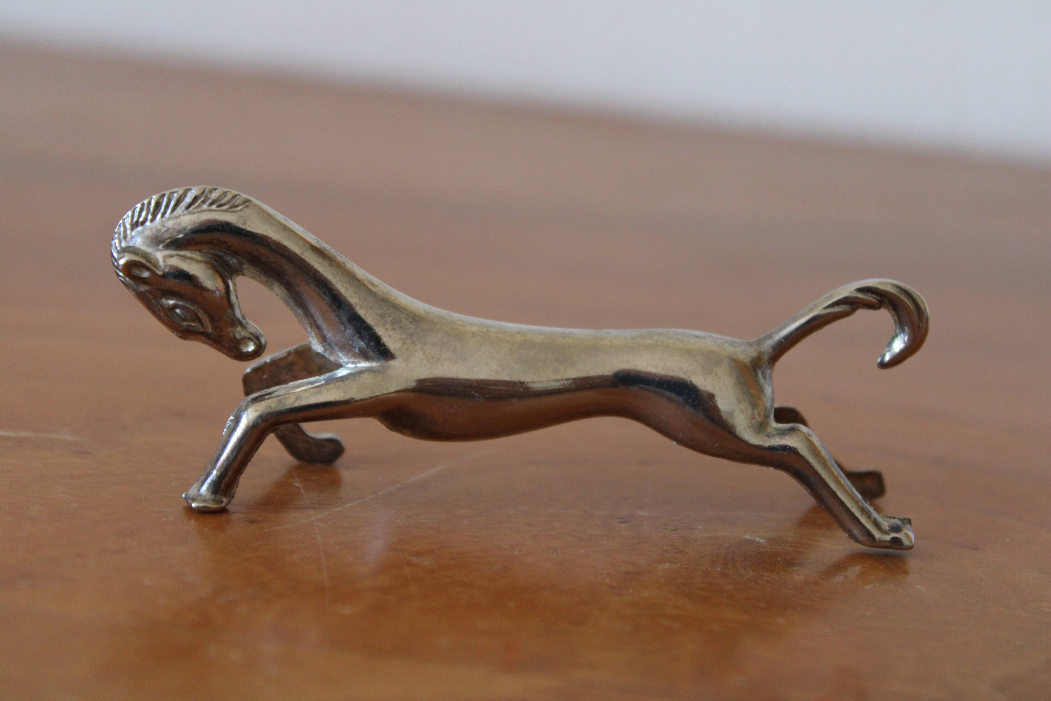 Set of 12 vintage knife rests, in silver metal