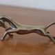 Set of 12 vintage knife rests, in silver metal