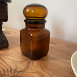 Old apothecary bottle in brown glass / jar