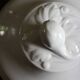 Antique soup tureen, white earthenware, with stopper decoration.