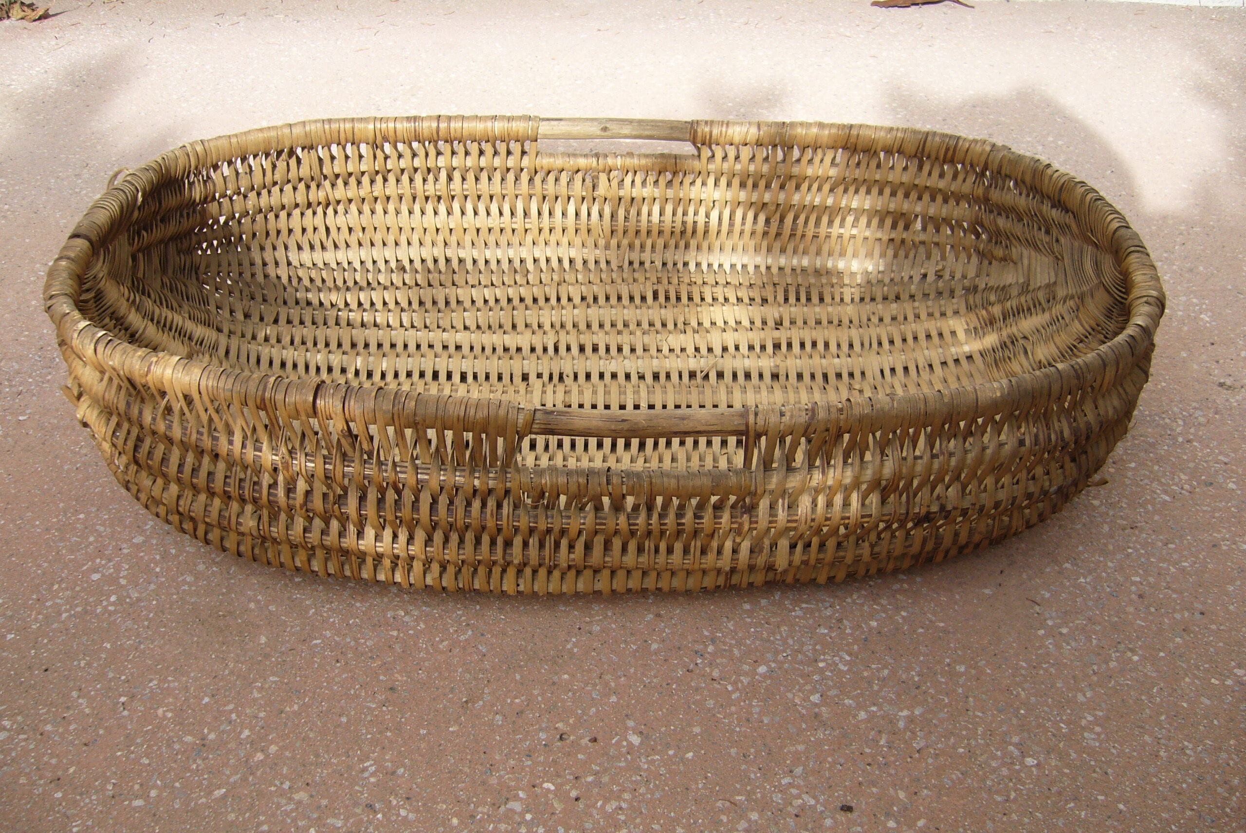 Old wicker laundry basket