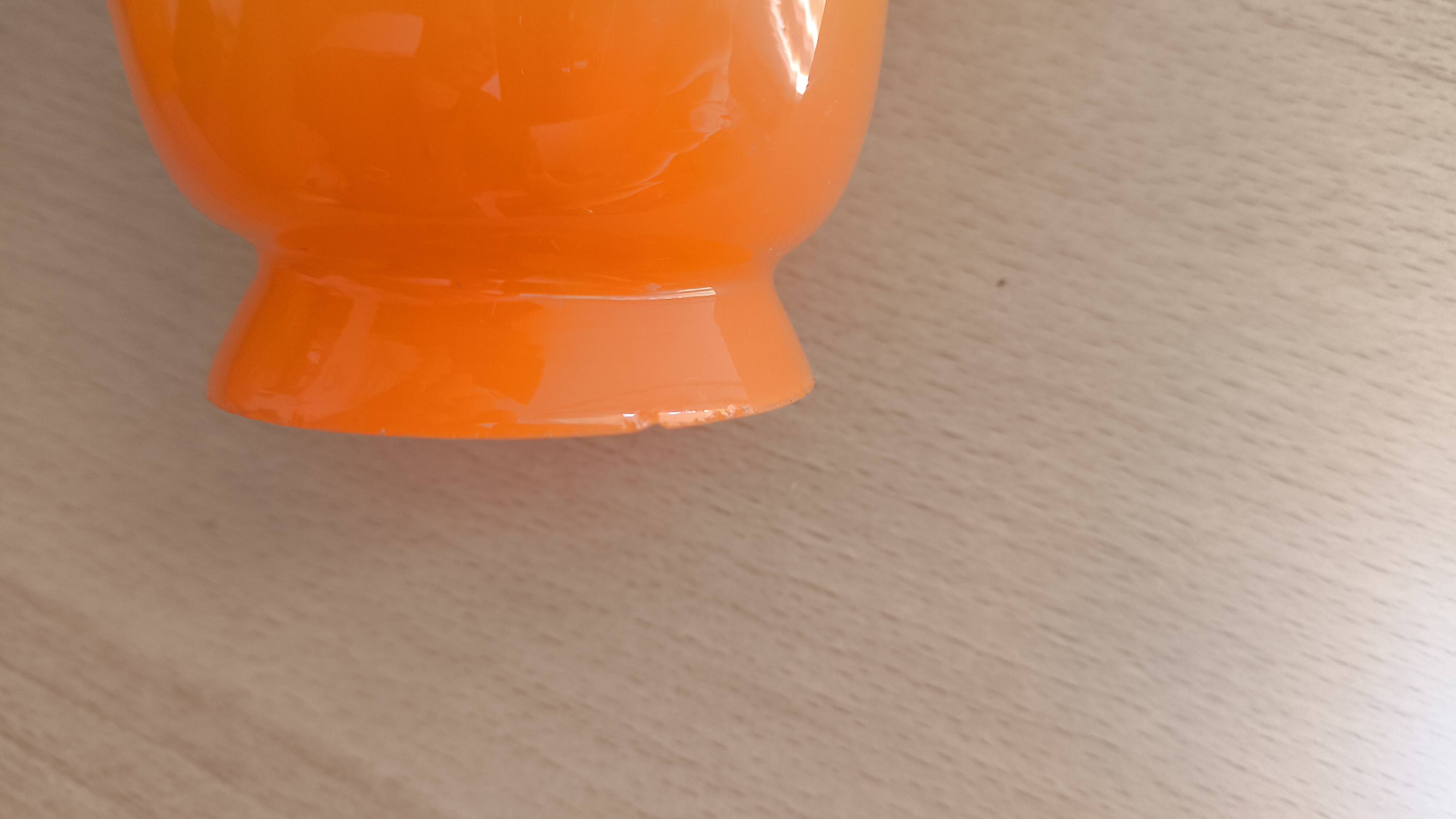 Pair of orange glass tulips with black trim, vintage 70s.