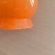 Pair of orange glass tulips with black trim, vintage 70s.