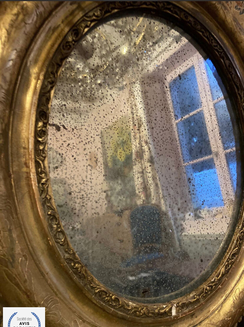 Mirror in gilded stucco nineteenth century