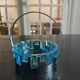 glass and hammered metal pocket emptier