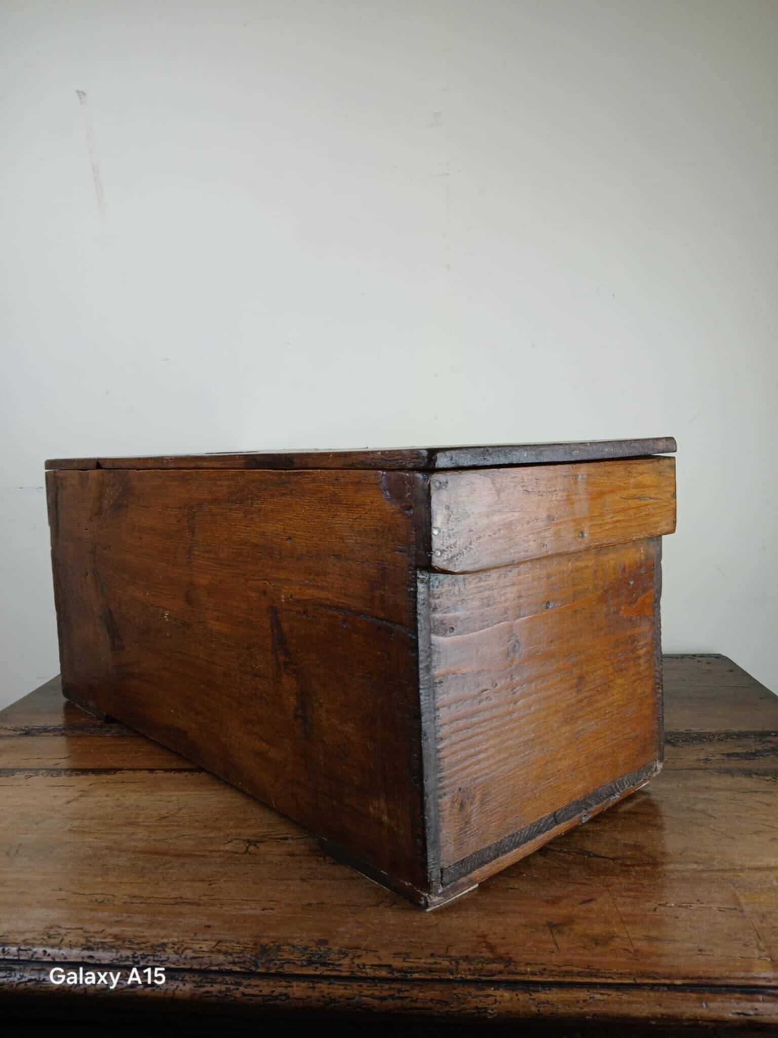 Old solid wood transport chest from the early 19th century