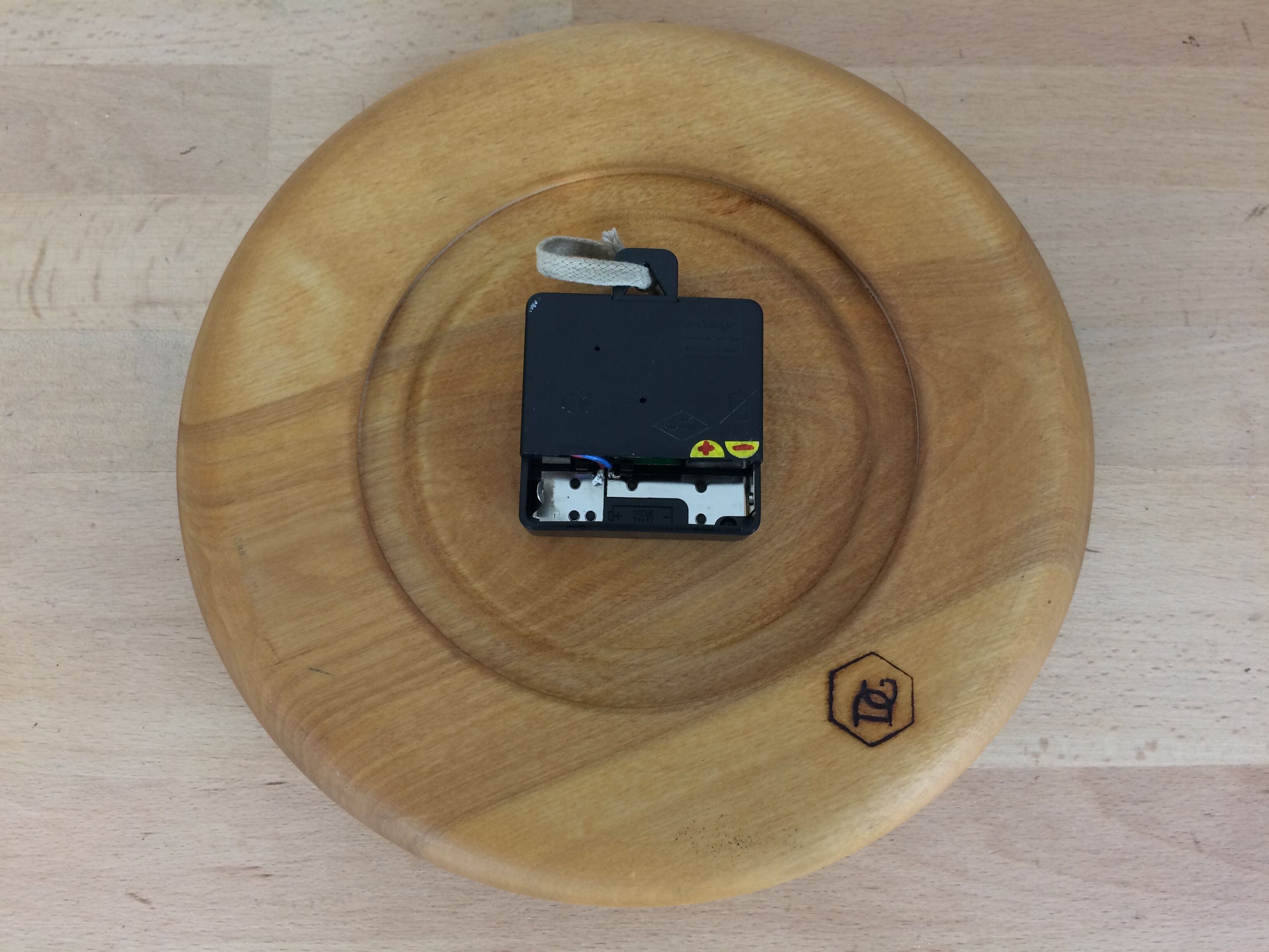 Wall clock in elm wood design