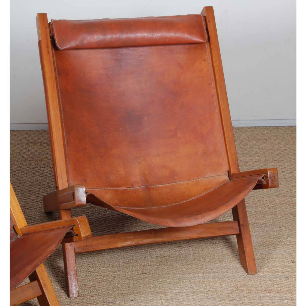 Pair of large wooden and leather armchairs from the 1980s