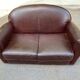 Burgundy brown leather living room sofa and club chair
