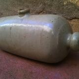 Old terracotta bottle