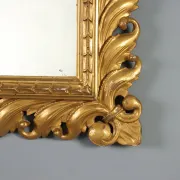 Eclectic antique mirror in carved and gilded wood, Italy, 20th century