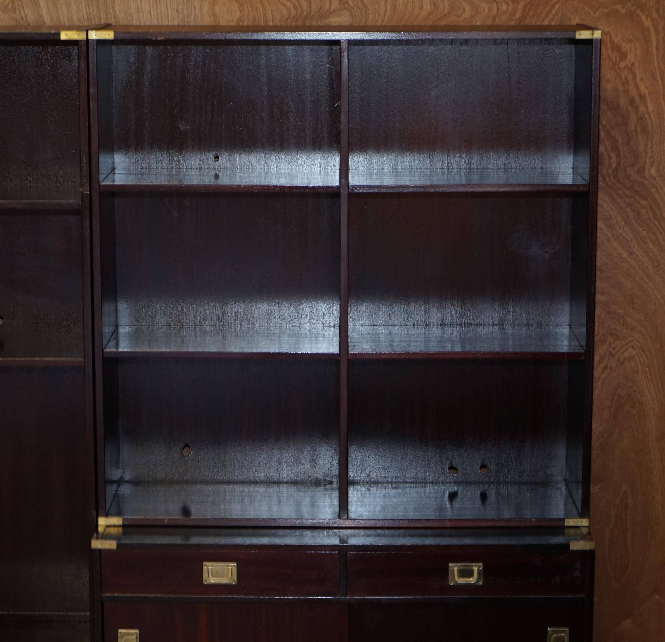 Three vintage style Military Campaign bookshelves, mahogany finish.