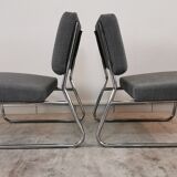 Pair of vintage chrome armchairs and "chicken foot" fabrics