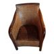 Fauteuil rotin tressé et bois exotique