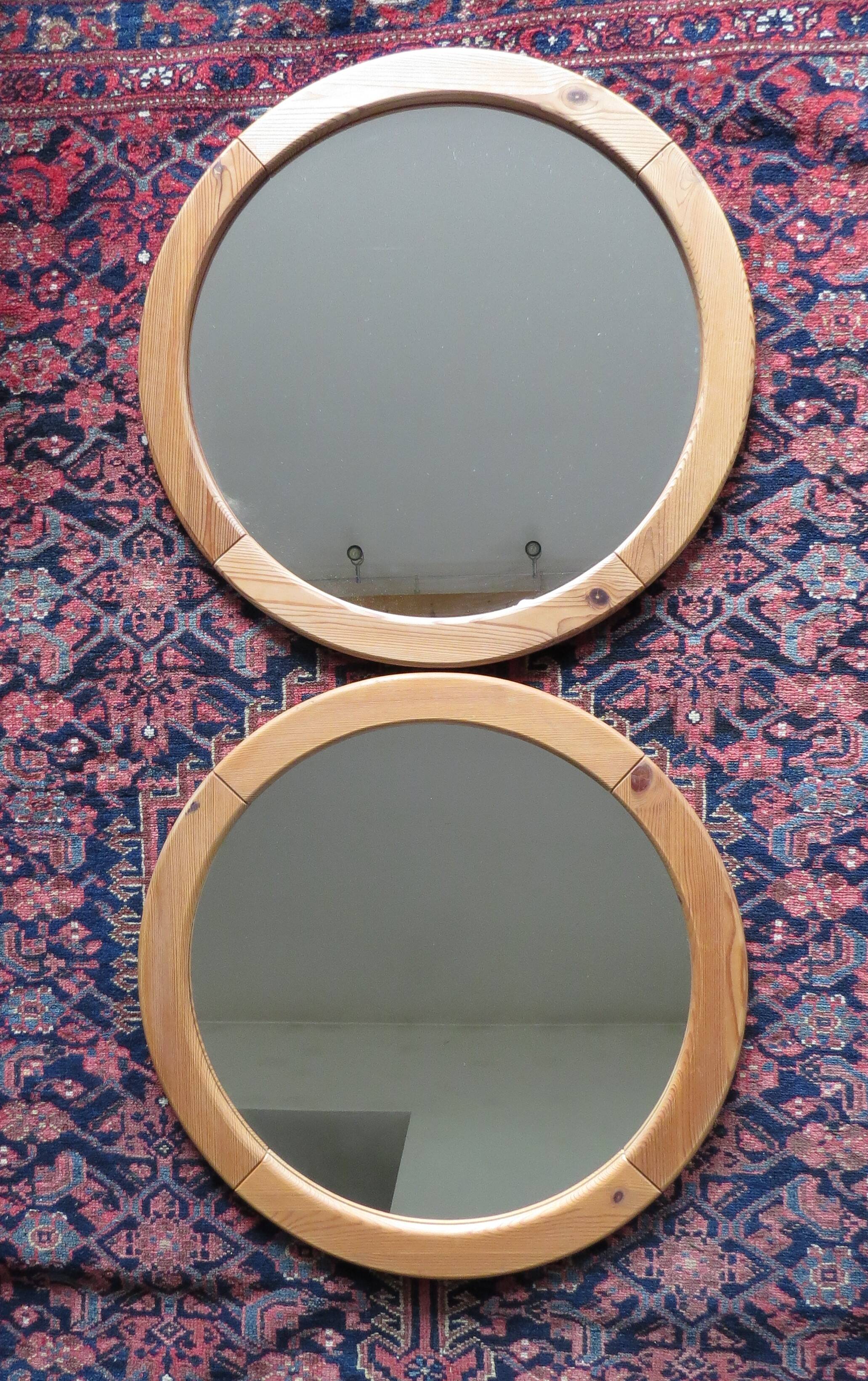 Pair of round Scandinavian pine mirrors from the 70s