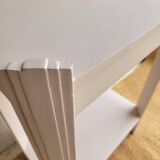 Small renovated Art Deco console in nude colour.