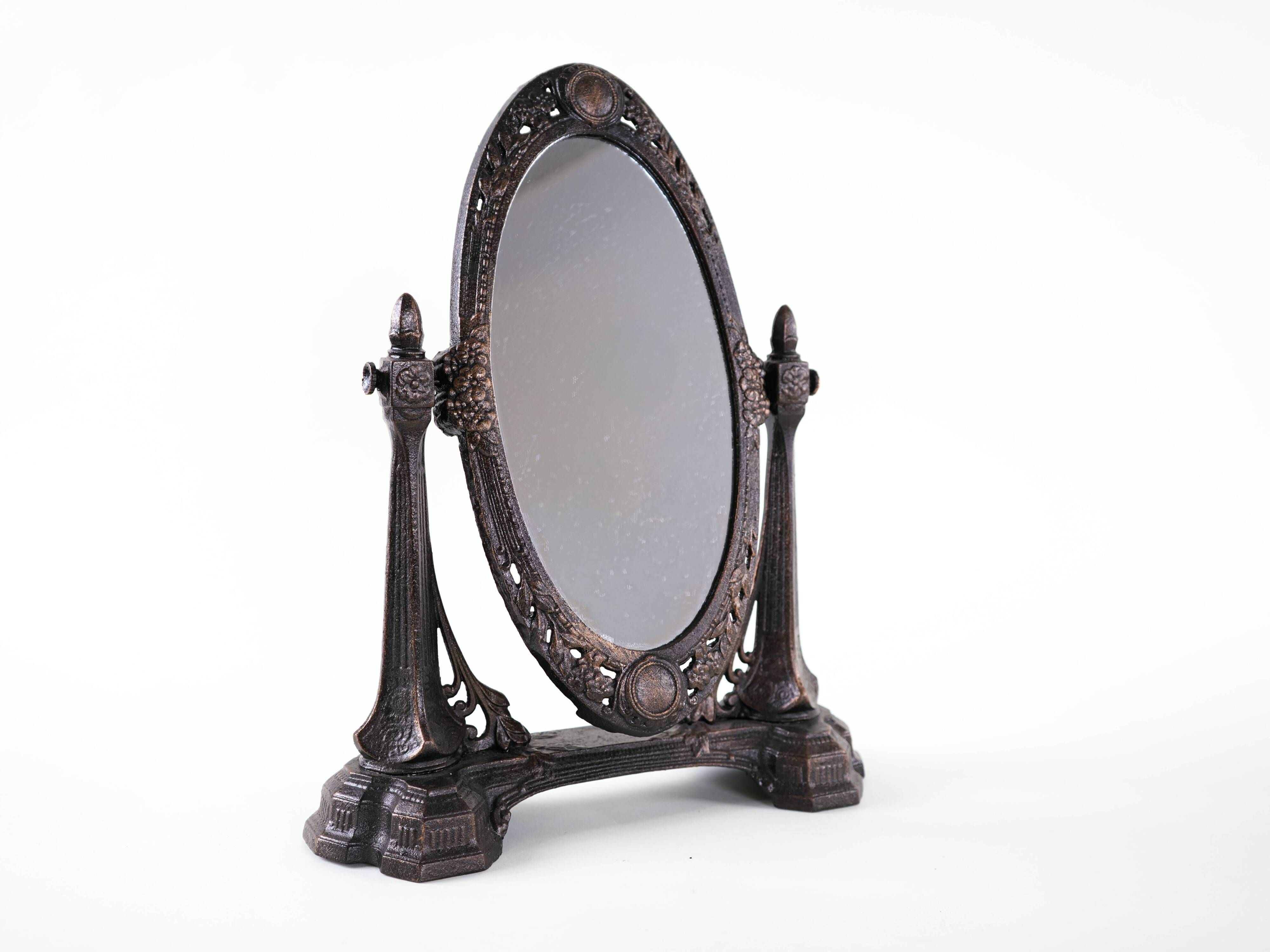 Art Nouveau table mirror with ornamental metal frame, early 20th century