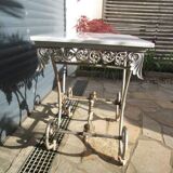 Butcher's table from the late 19th century, wrought iron, brass, and marble.